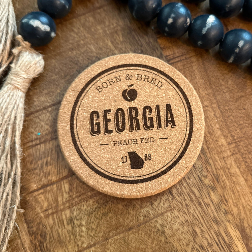 Cork Coaster Set | 8-Piece Set w/Holder | Round "Georgia Born" Cork Coaster Set - Seeds & Sawdust